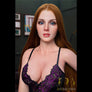 Realistic Cinderella sex doll by MyRealDolls with detailed facial features, long hair, and life-like body in a seated pose.