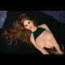 Realistic Adrienne busty sex doll by MyRealDolls with detailed facial features and lifelike skin texture.