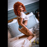 Red-headed Andrea sex doll by MyRealDolls with realistic features and detailed facial expression, designed for lifelike companionship.