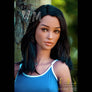 MyRealDolls April Bombshell sex doll with realistic facial features, long blonde hair, and detailed body design.