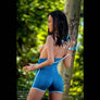 Realistic April Bombshell sex doll by MyRealDolls, featuring lifelike facial features, long hair, and detailed body anatomy.