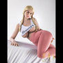 Blonde busty sex doll from MyRealDolls, featuring realistic facial features and detailed body design.