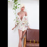 MyRealDolls Jenna Model, tall and realistic sex doll with detailed features, standing upright in a neutral setting.