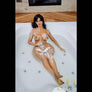 MyRealDolls Katy BDSM sex doll with realistic features, wearing black latex and bondage accessories, designed for adult pleasure.