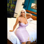MyRealDolls Klara Tigress sex doll with realistic features, long hair, and detailed facial and body design, lying on a white surface.