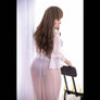 Realistic Meggy sex doll by MyRealDolls, showcasing detailed facial features, realistic skin texture, and lifelike body posture.