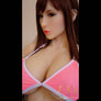 Realistic Miyuk Piper sex doll by MyRealDolls featuring detailed facial features and lifelike body in a pose.