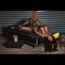Realistic Sam Tanned Sex Doll by MyRealDolls featuring detailed facial features and a lifelike body pose.