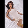 Scarlett red-head sex doll from MyRealDolls featuring realistic facial features and detailed body design.