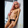 MyRealDolls Selena Petite sex doll showing realistic facial features, long hair, and a life-like body pose.
