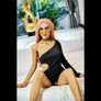 MyRealDolls Selena petite sex doll with realistic facial features, blonde hair, and detailed body for lifelike appearance.
