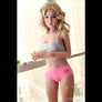 Sunny Skinny Sweet Sex Doll by MyRealDolls featuring realistic facial features, slender body, and detailed skin texture.