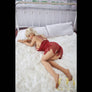 Suzie Sex Doll by MyRealDolls with realistic features and detailed figure, showcasing her lifelike head and curvy body.
