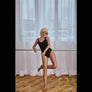 Ulrika Petite Sex Doll by MyRealDolls featuring realistic facial features, seated pose, and detailed body design.