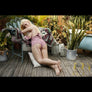 Realistic Summer Sex Doll from MyRealDolls with detailed facial features, blonde hair, and a lifelike body pose.