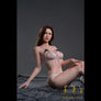 Realistic Zelie sex doll from MyRealDolls showing her detailed facial features and lifelike body in a neutral pose.